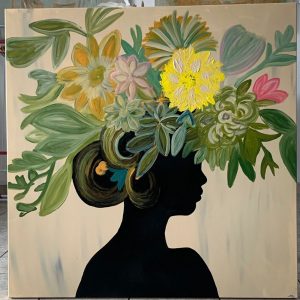 Künstlerisches Portrait mit Blumen am Kopf